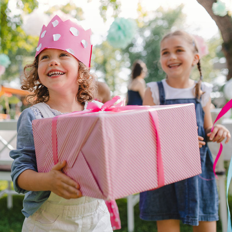 Young Child Holding Gift